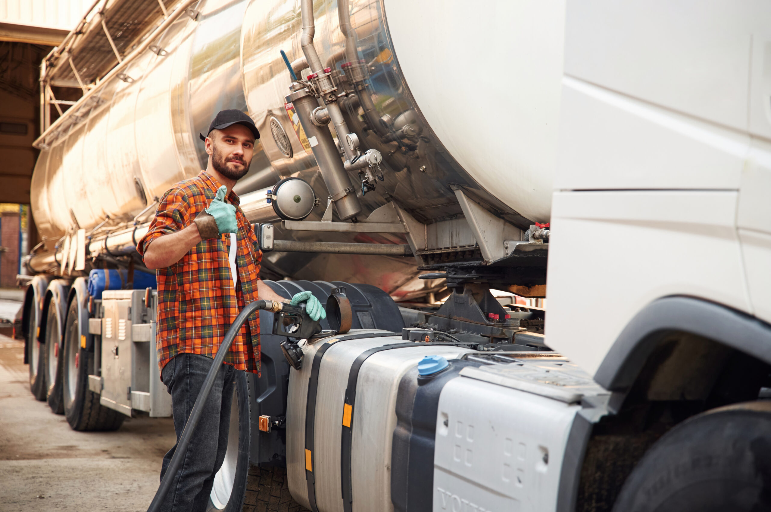 holding refueling device young truck driver in ca 2025 03 18 19 44 01 utc scaled